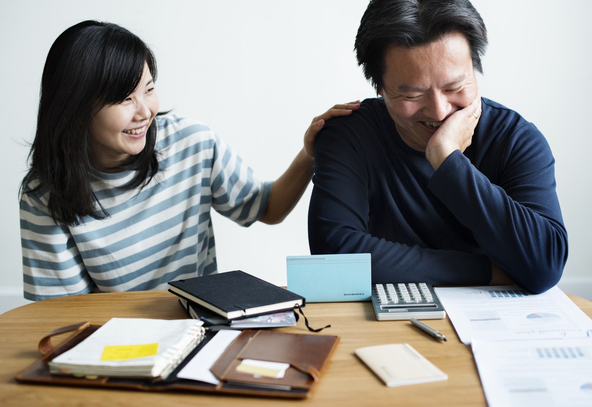 Asian couple planning for the investment